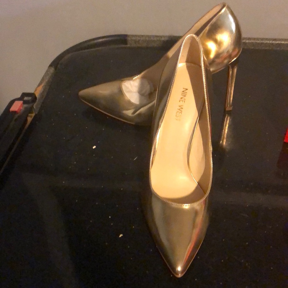 Gold pumps , never worn, size 8